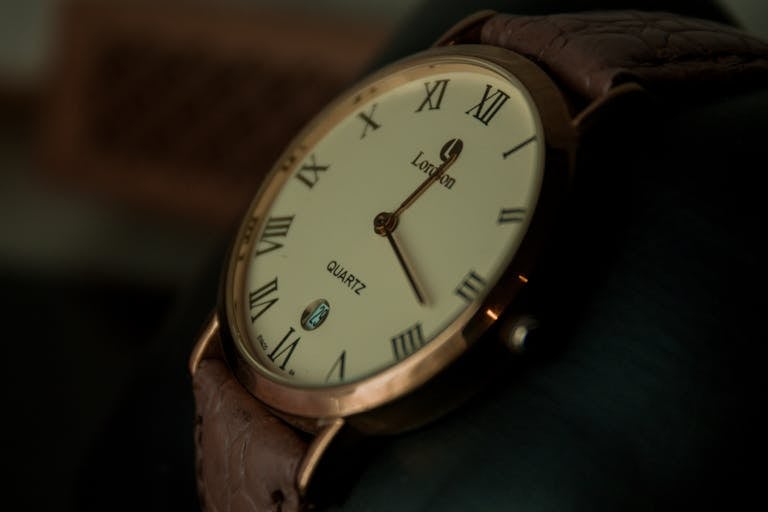 Elegant wristwatch with Roman numerals on display. Captured in Paris, France.